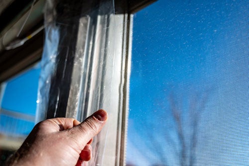 Winterize windows and reduce drafts with weatherstripping and window insulation film